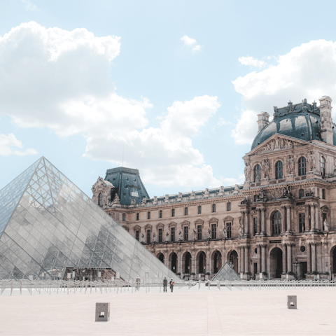Stroll along pretty streets to the Louvre or hop on the Metro