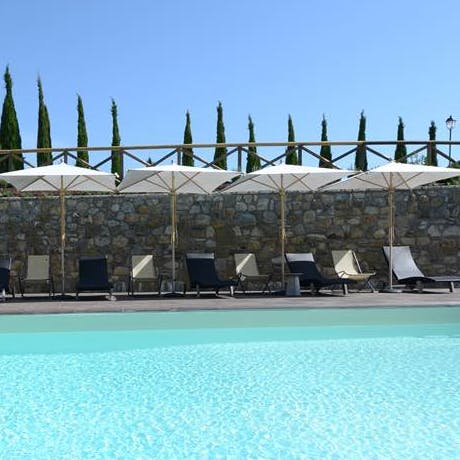 Soak up the Tuscan sunshine next to the tranquil pool