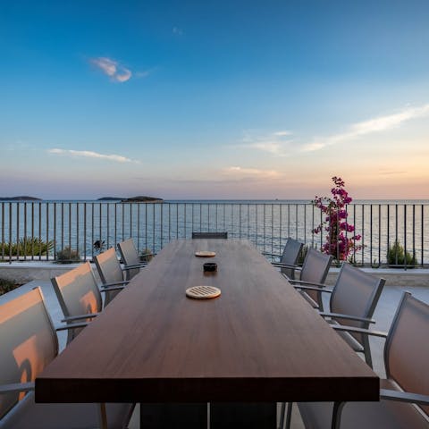Enjoy a glass of Croatian wine at sunset