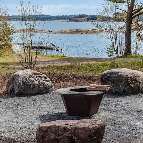 Gather around the fire pit and enjoy views across the archipelago