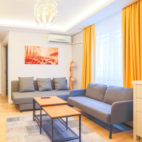 Kick back in the bright living room after a day of touring the city on foot