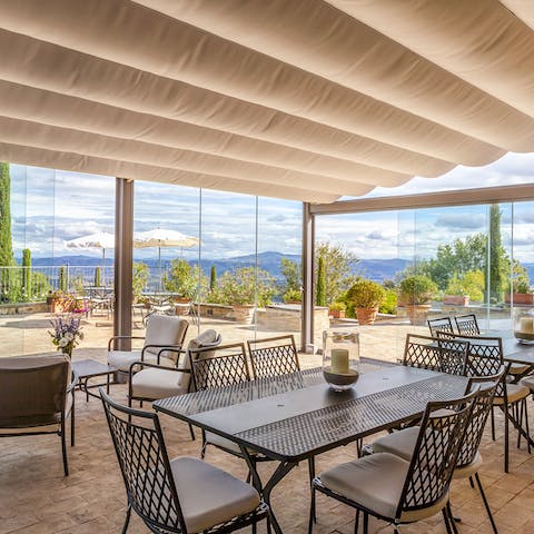 Take breakfast in the huge sunroom overlooking the landscape from walls of glass