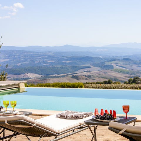 Slip into the infinity pool and admire the rolling hills before you