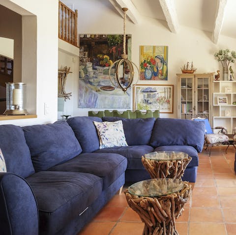 Curl up on the cosy sofa after a long day and admire the quirky artwork