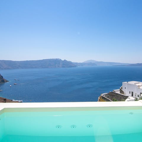 Look out across a gorgeous bay from the comfort of the hot tub