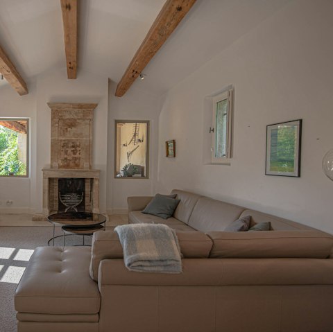 Spend cosy evenings by the wood-burning fireplace