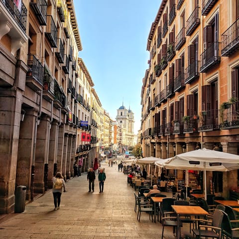 Visit bustling Plaza Mayor, a nine-minute walk away