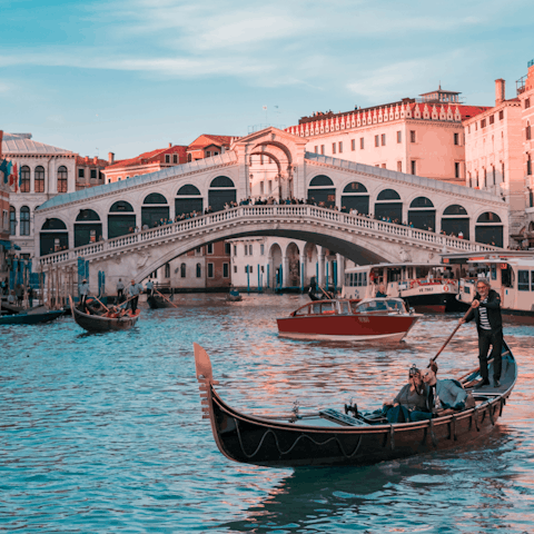 Walk just a few minutes to the iconic Rialto Bridge
