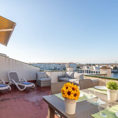 Dine, sunbathe and relax on the huge, sunny terrace