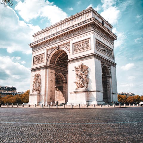 Visit the iconic Arc de Triomphe – it's a short walk away