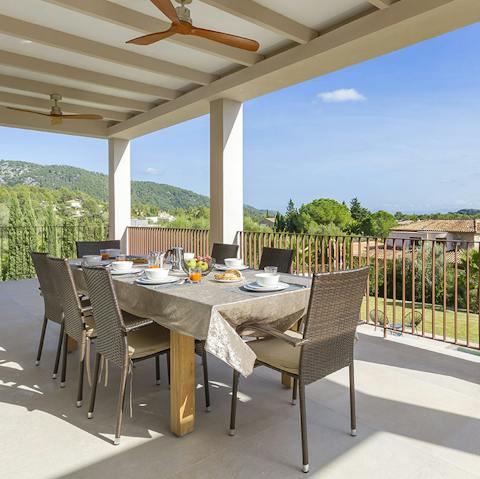 Gather for memorable drinks and meals as the sun sets across the island