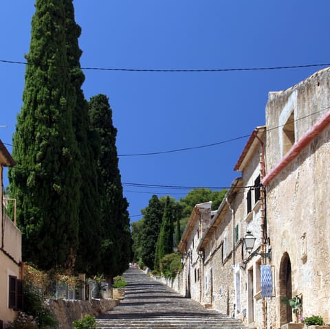 Wander the atmospheric streets of Pollença – just a short drive away