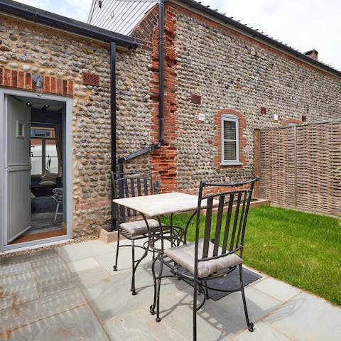 Relax in the Norfolk sun in the courtyard