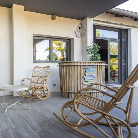 Serve pastis by the patio bar and toast to a happy holiday at sunset