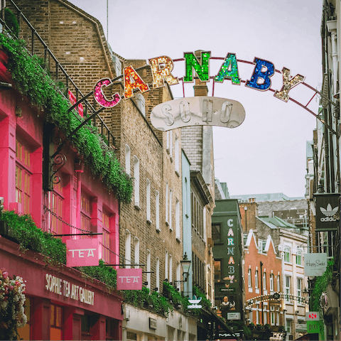 Browse the boutiques on Carnaby Street, an eight-minute stroll away