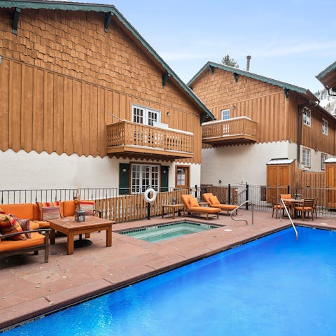 Enjoy shared access to a heated pool and hot tub
