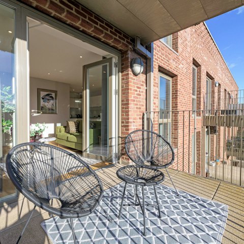 Start your day with a coffee on the private balcony