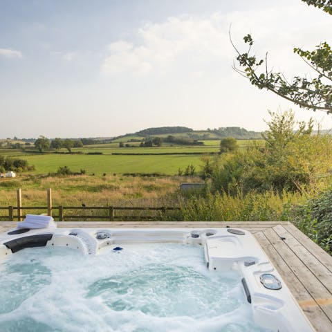 Enjoy a sunset soak in the hot tub after a day exploring the countryside
