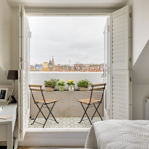 Wake up in the main bedroom and step out onto its private balcony
