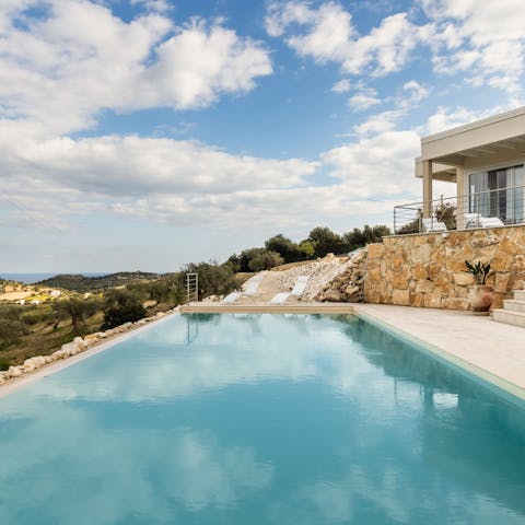 Spend warm afternoons floating about in the communal infinity pool