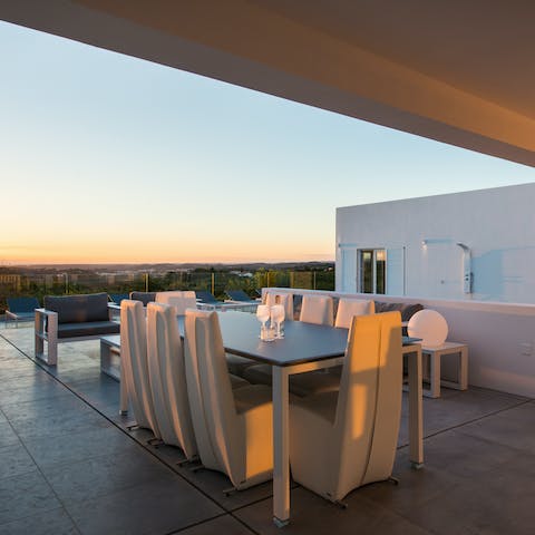 Enjoy a barbecued dinner in your elegant outdoor dining room