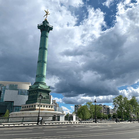 Visit the historic Place de la Bastille, a twenty-five-minute walk away
