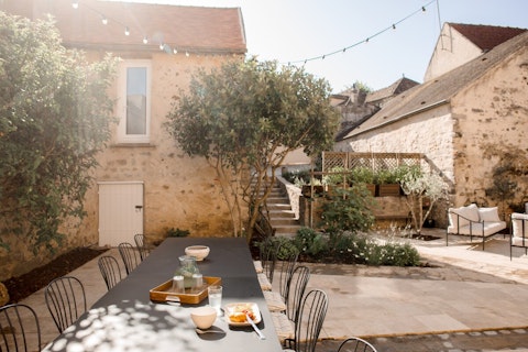 Linger over breakfast in the sun-filled stone courtyard