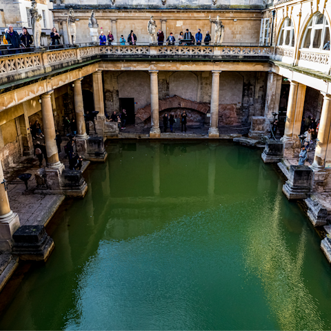 Visit the Roman Baths, dating back to the first century