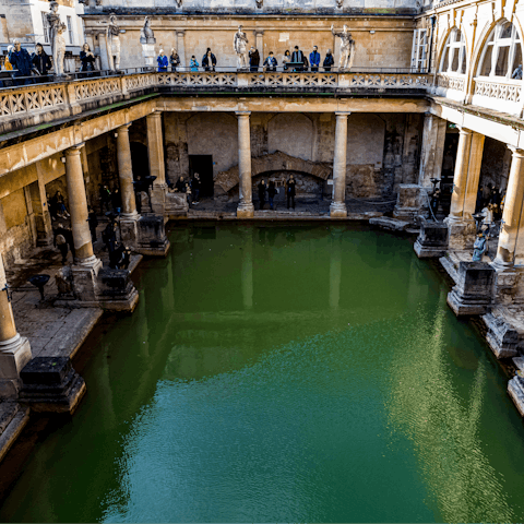 Visit the Roman Baths, dating back to the first century