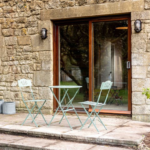 Enjoy breakfast on the private patio