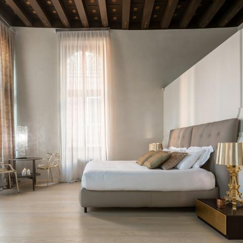 Wake up each morning to sunlight seeping in through vast lead windows