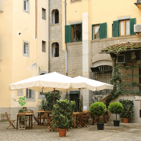 Soak up the atmosphere while sipping drinks in a bar