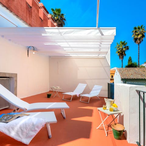 Enjoy refreshing drinks whilst lounging the terrace