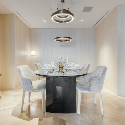 Gather together for an elegant meal at the dining table when you're not out sampling the local beachfront restaurants