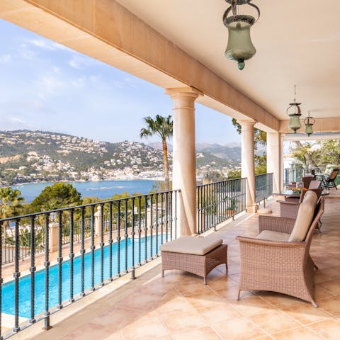 Sip your morning coffee from your private balcony overlooking the bay
