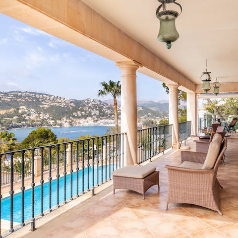 Sip your morning coffee from your private balcony overlooking the bay