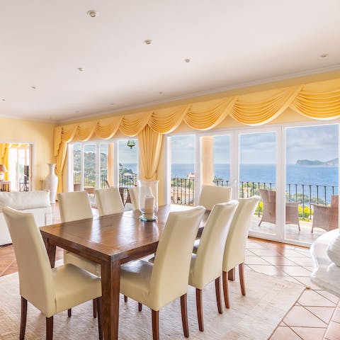 Share memorable meals together around the wooden dining table