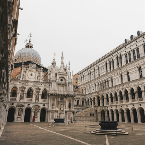 Admire the Gothic grandeur of the Palazzo Ducale