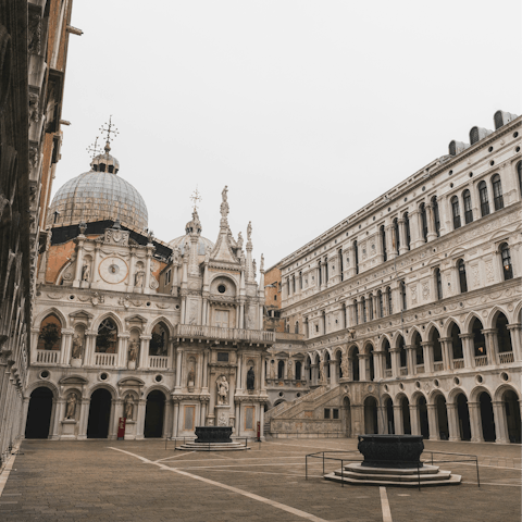 Admire the Gothic grandeur of the Palazzo Ducale