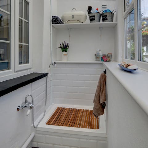 Hose off muddy paws and boots in the porch shower