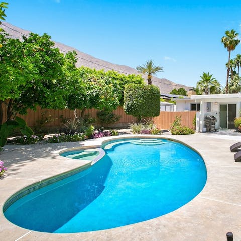 Splash around in the kidney-shaped pool