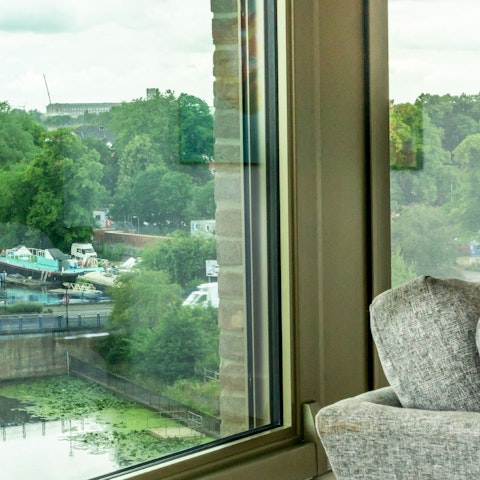 Curl up with a cuppa here for a spot of river life watching