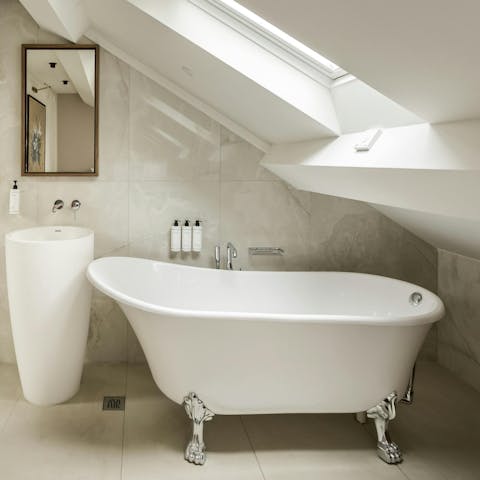 Relax in the freestanding bath after a busy day in the City of Light