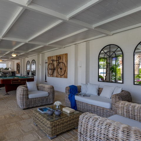 Chill out on the covered terrace with snacks and drinks