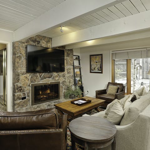 Get cosy and comfortable in front of the fireplace