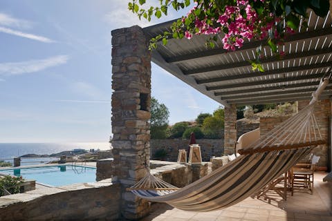 Take the weight off in the hammock with a book and a glass of wine