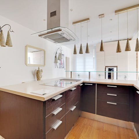 Whip up some bites and enjoy a glass of wine around the island