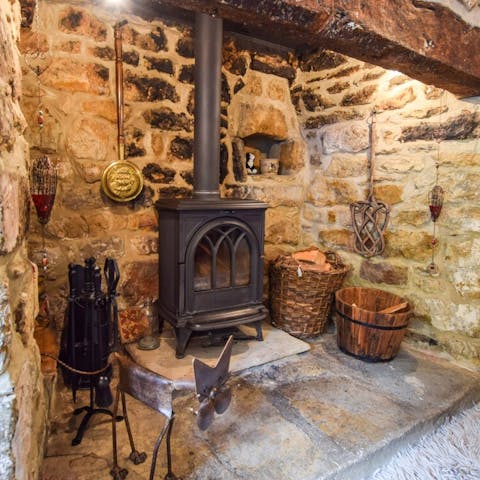 Spend a cosy evening warming your toes by the fire