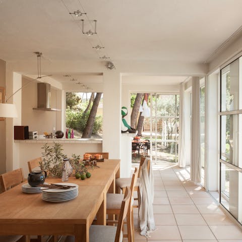 Gather for French-inspired feasts in the outdoor dining room