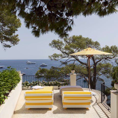 Soak up the sun and admire the sea views from the terrace